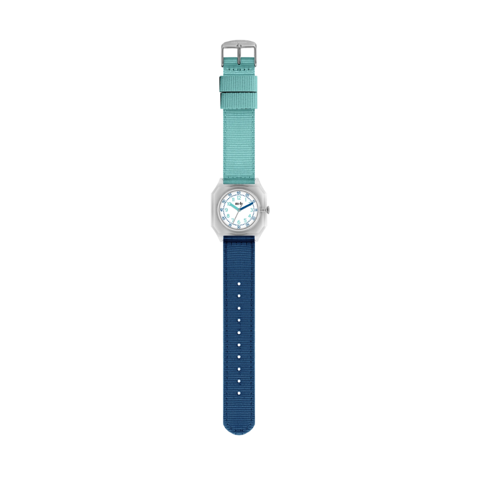 A wristwatch with a two-tone strap, featuring a mint green top section and a navy blue bottom section, with a transparent case and white dial, centered on a plain white background.