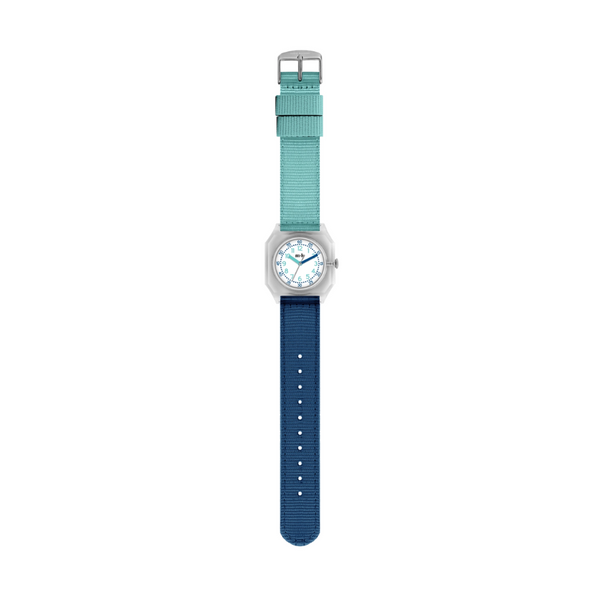 A wristwatch with a two-tone strap, featuring a mint green top section and a navy blue bottom section, with a transparent case and white dial, centered on a plain white background.